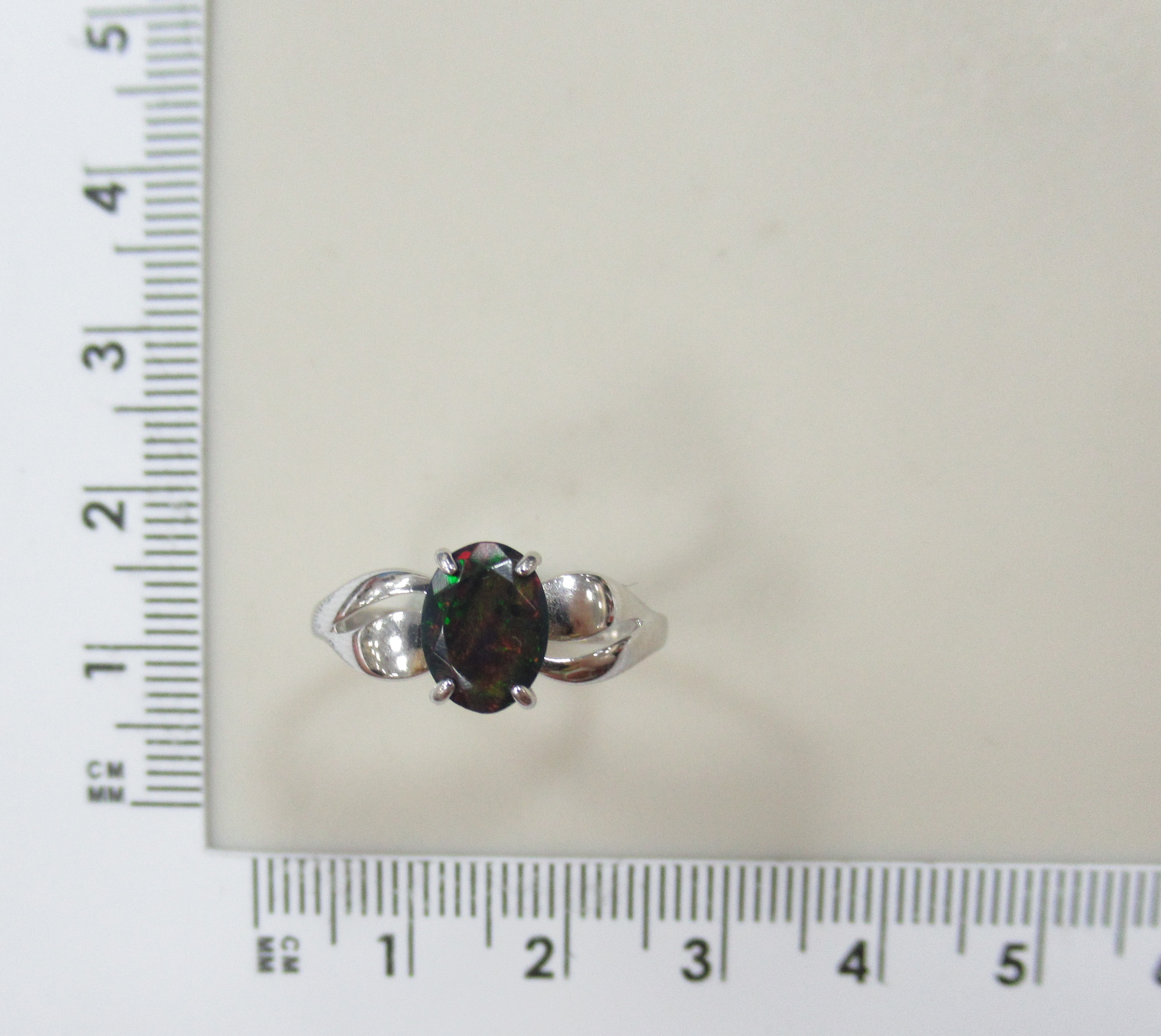 Серебряное кольцо с опалом Арлекин